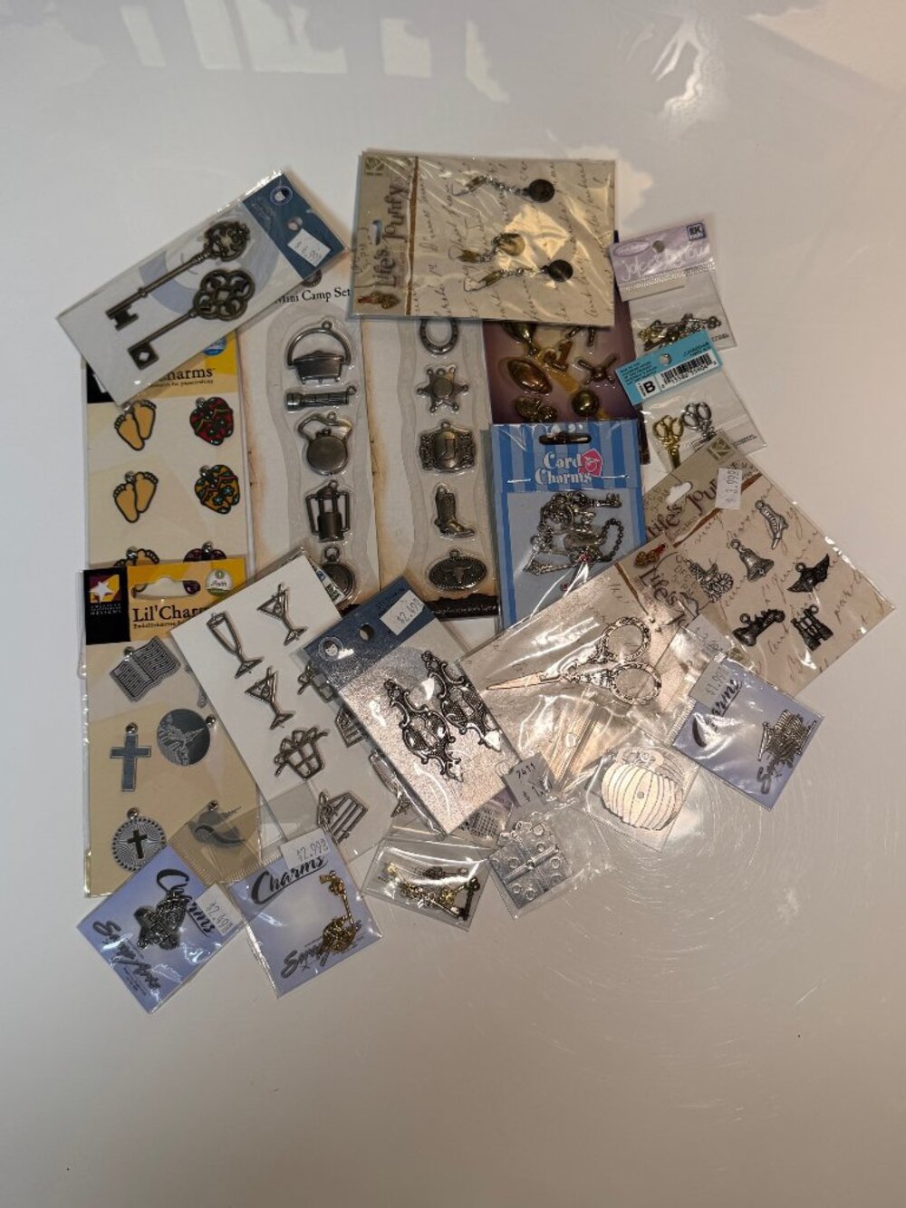 #110  20 Pieces of Charms, etc